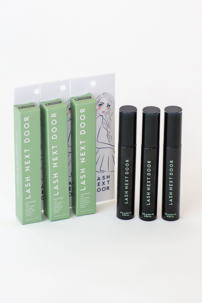 Lash Next Door products including boxes and bottles on a white background