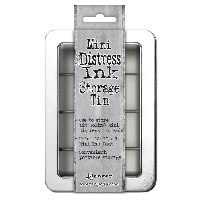 Tim Holtz - Mini Distress Ink Storage Tin - Holds 12. Ideal storage solution for mini distress ink pads! Organize and transport easily in a convenient clear windowed hinged tin. This package contains one 1x6.25x4.25 inch storage tin that will hold up to twelve mini inks. Imported. Available at Embellish Away in Bowmanville Ontario Canada..