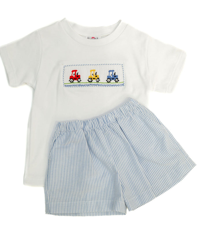 Smocked Tractor T-Shirt and Short Set by Ruth and Ralph, flat lay showing striped shorts and smocked tractor embroidery on white tee