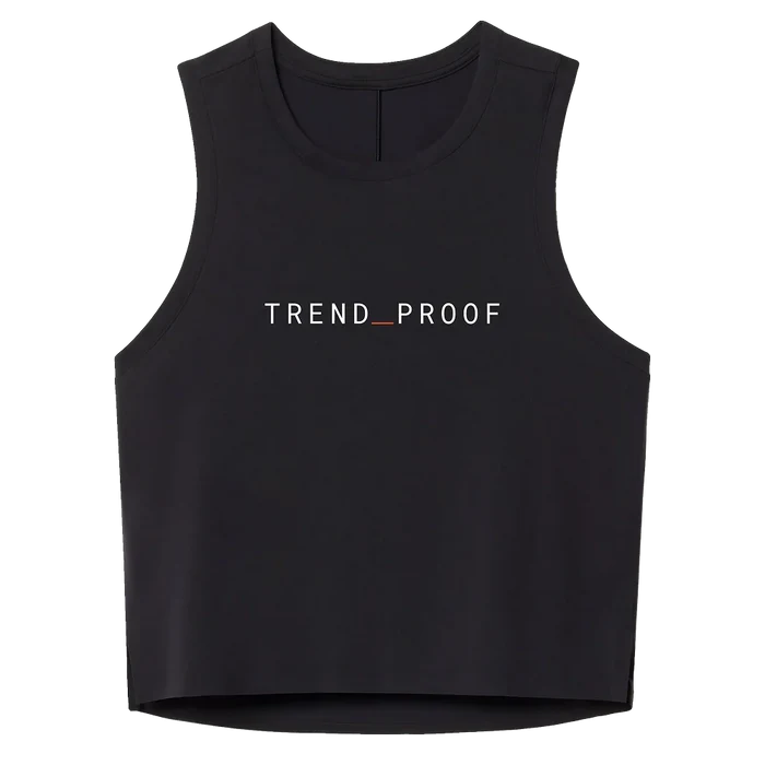 Front view of a black sleeveless athletic tank with “TREND_PROOF” printed across the chest in white lettering with a red underscore.