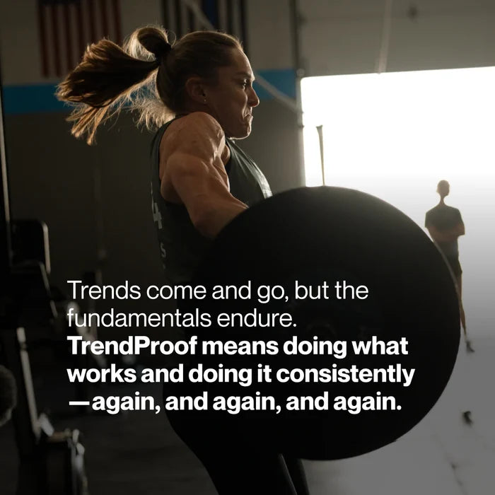 Woman lifting a barbell in a gym with text: “Trends come and go, but the fundamentals endure. TrendProof means doing what works and doing it consistently—again, and again, and again.”