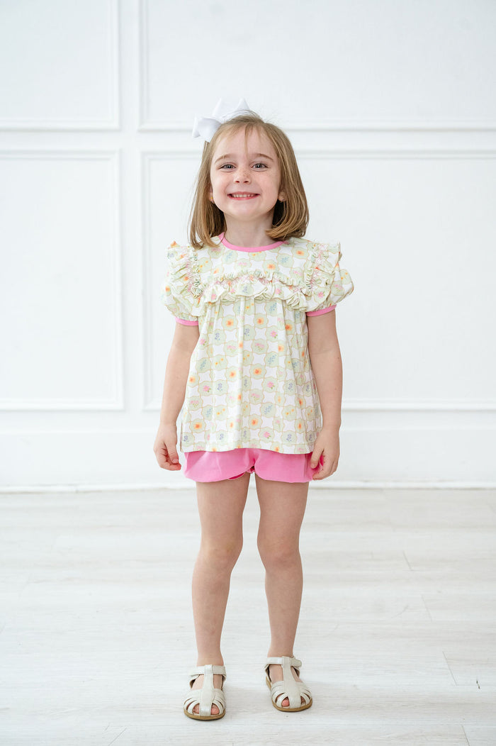 A little girl wearing this bloomer set will be ready for any spring adventure, whether it's a playdate or an outing with family.