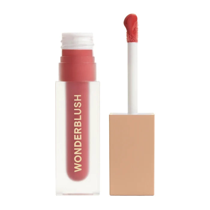 WONDERBLUSH La Laque Tinted Lip Oil in Abricot, showing the sleek tube and applicator with soft peach-colored lip oil.